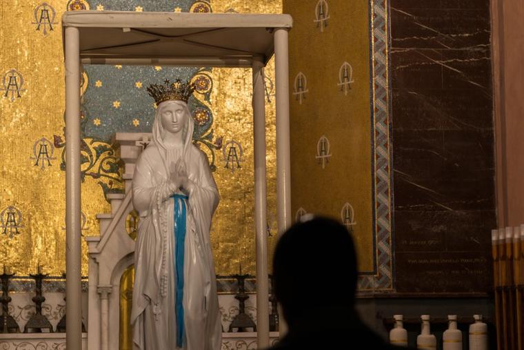 Pilgrims seek healing and peace at Lourdes. The Church commemorates Our Lady of Lourdes each Feb. 11, which is also observed as World Day of the Sick.